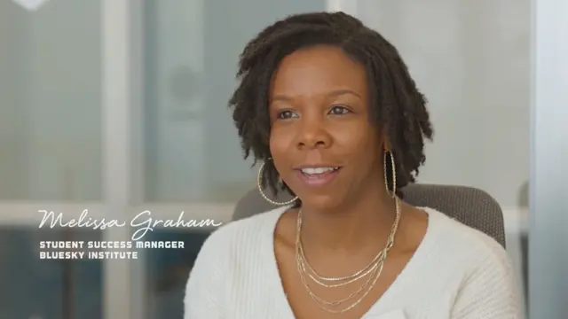image of woman speaking in an office
